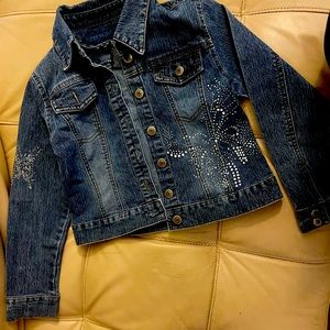 EUC. Girls Jean jacket. Size medium. Butterfly decor.